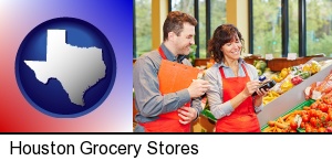 Houston, Texas - two grocers working in a grocery store