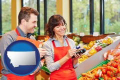 two grocers working in a grocery store - with MT icon