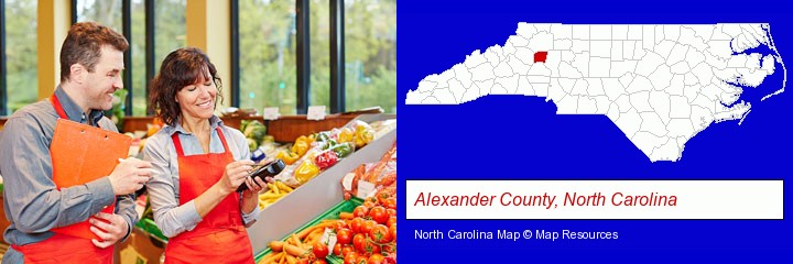 two grocers working in a grocery store; Alexander County, North Carolina highlighted in red on a map