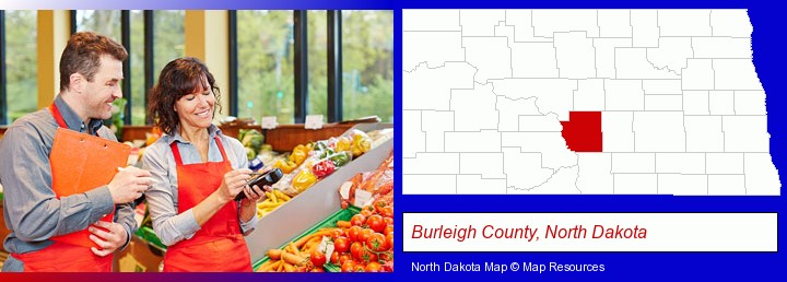 two grocers working in a grocery store; Burleigh County, North Dakota highlighted in red on a map