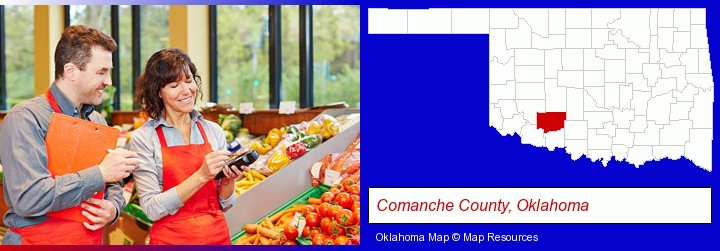 two grocers working in a grocery store; Comanche County, Oklahoma highlighted in red on a map