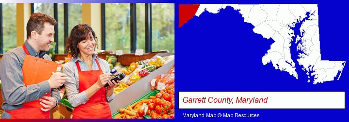 two grocers working in a grocery store; Garrett County, Maryland highlighted in red on a map