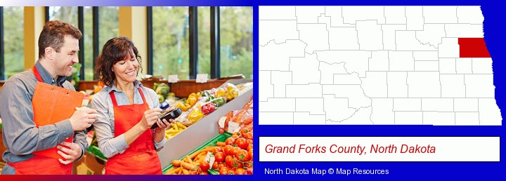 two grocers working in a grocery store; Grand Forks County, North Dakota highlighted in red on a map
