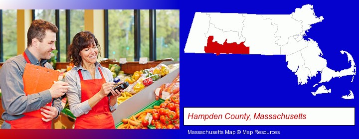 two grocers working in a grocery store; Hampden County, Massachusetts highlighted in red on a map