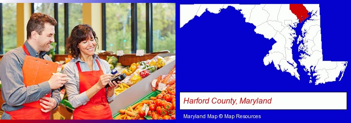 two grocers working in a grocery store; Harford County, Maryland highlighted in red on a map