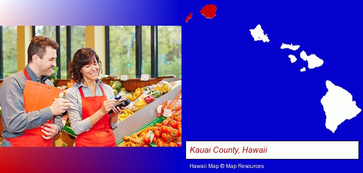 two grocers working in a grocery store; Kauai County, Hawaii highlighted in red on a map