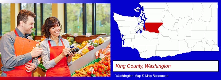 two grocers working in a grocery store; King County, Washington highlighted in red on a map