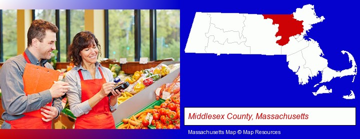 two grocers working in a grocery store; Middlesex County, Massachusetts highlighted in red on a map