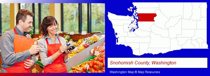 two grocers working in a grocery store; Snohomish County, Washington highlighted in red on a map