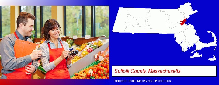 two grocers working in a grocery store; Suffolk County, Massachusetts highlighted in red on a map