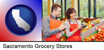 two grocers working in a grocery store in Sacramento, CA