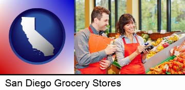 two grocers working in a grocery store in San Diego, CA