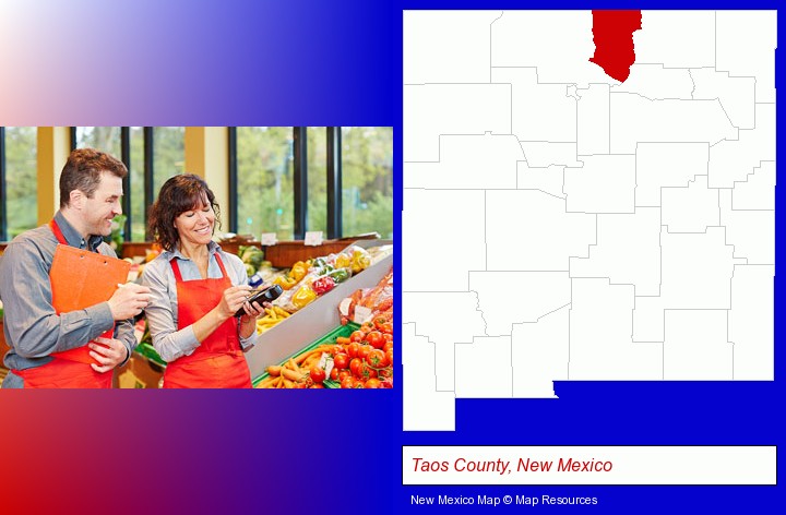 two grocers working in a grocery store; Taos County, New Mexico highlighted in red on a map